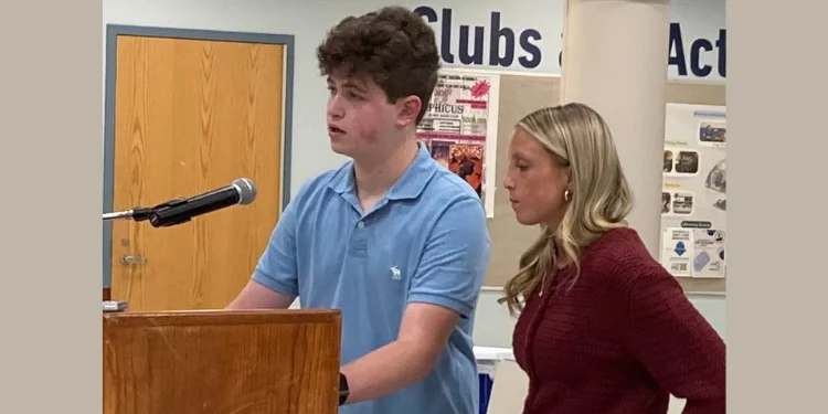 Zander Bauer speaking at the Westport Board of Education meeting at Staples High School